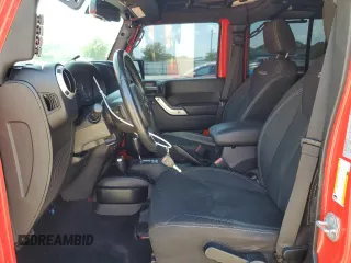 2018 Jeep Wrangler Unlimited Sahara with VIN 1C4BJWEG4JL802145, listed as a Copart auction lot 61931555 with 119,681 mi miles and Salvage title. Bid and sale history available at DreamBid. Image 7.