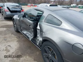 2014 Ford Mustang V6 with VIN 1ZVBP8AM1E5277123, listed as a IAAI auction lot 41917529 with 121,631 mi miles. Bid and sale history available at carsss.com. Image 17.
