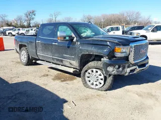 2017 GMC Sierra 2500HD Denali z VIN 1GT12UEY5HF118445, wystawiony jako IAAI lot #41327986 z przebiegiem 158 970 mil mil oraz . Historia ofert i sprzedaży dostępna na DreamBid. Obrazek 1.