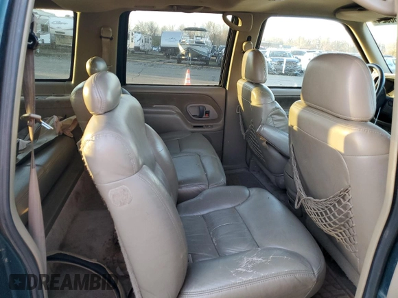1997 GMC Suburban with VIN 3GKFK16RXVG513571, listed as a Copart auction lot 82086924 with 190,142 mi miles and Salvage title. Bid and sale history available at DreamBid. Image 10.