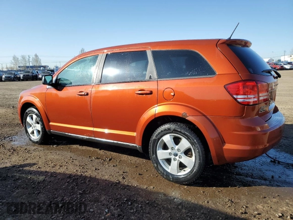 2013 Dodge Journey American Value with VIN 3C4PDCAB4DT590975, listed as a Copart auction lot 55627725 with 212,659 mi miles and Clean Title. Bid and sale history available at DreamBid. Image 2.