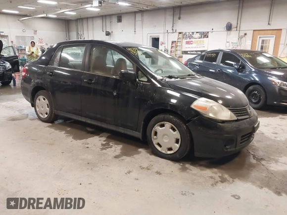 2007 Nissan Versa 1.8 SL with VIN 3N1BC11E47L411983, listed as a IAAI auction lot 41391334 with 201,830 mi miles. Bid and sale history available at carsss.com. Image 1.