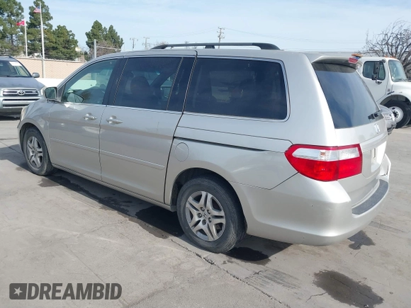 2005 Honda Odyssey EX-L with VIN 5FNRL38675B422980, listed as a IAAI auction lot 41680392 with 188,145 mi miles. Bid and sale history available at carsss.com. Image 3.