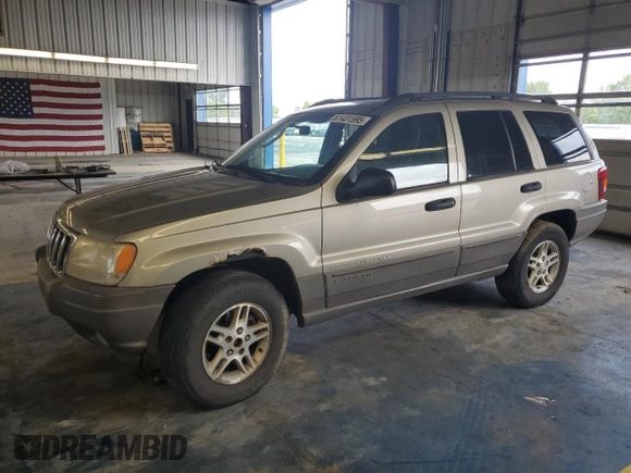 2003 Jeep Grand Cherokee Laredo with VIN 1J4GW48S43C567559, listed as a Copart auction lot 61431595 with 249,998 mi miles and Salvage title. Bid and sale history available at DreamBid. Image 1.
