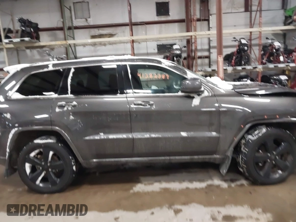 2015 Jeep Grand Cherokee Laredo with VIN 1C4RJFAGXFC752489, listed as a IAAI auction lot 41382389 with 147,892 mi miles. Bid and sale history available at carsss.com. Image 14.