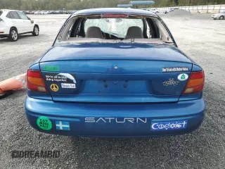2000 Saturn SL with VIN 1G8ZH5284YZ220128, listed as a Copart auction lot 73846764 with 134,478 mi miles and Non Repairable. Bid and sale history available at carsss.com. Image 6.