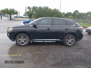 2013 Lexus RX 450h with VIN JTJZB1BA3D2006802, listed as a IAAI auction lot 42720067 with 117,291 mi miles and . Bid and sale history available at DreamBid. Image 14.