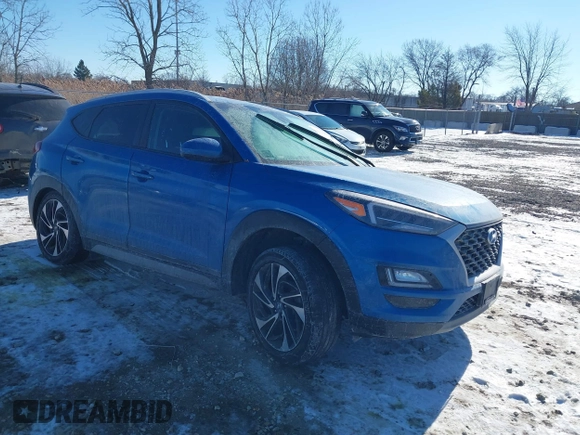 2019 Hyundai Tucson Sport with VIN KM8J33ALXKU857925, listed as a IAAI auction lot 41369786 with 41,365 mi miles. Bid and sale history available at carsss.com. Image 1.