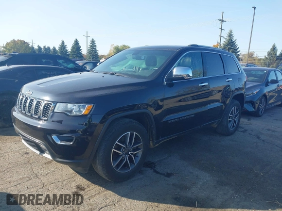 2021 Jeep Grand Cherokee 80th Anniversary with VIN 1C4RJFBG6MC711983, listed as a IAAI auction lot 40633511 with 22,480 mi miles and . Bid and sale history available at DreamBid. Image 2.