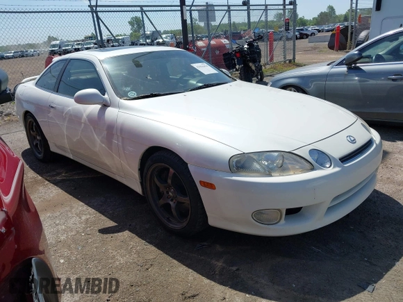1997 Lexus SC 300 with VIN JT8CD32Z2V0039032, listed as a IAAI auction lot 42556454 with 164,629 mi miles and . Bid and sale history available at DreamBid. Image 1.