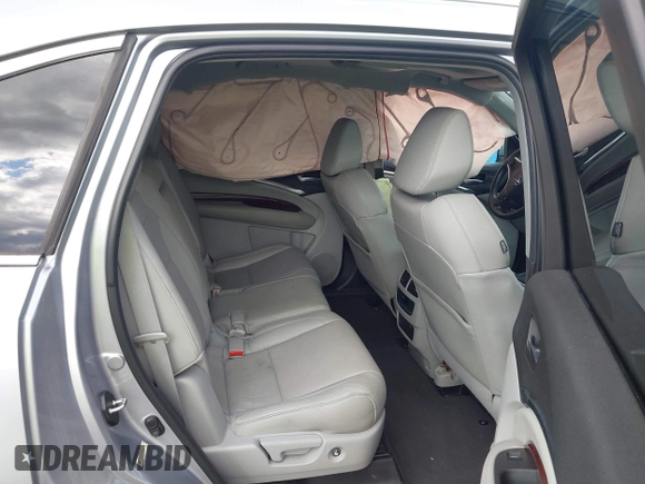 2016 Acura MDX with VIN 5FRYD3H21GB009055, listed as a IAAI auction lot 42012020 with 132,058 mi miles and . Bid and sale history available at DreamBid. Image 8.