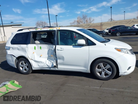 2012 Toyota Sienna LE AAS with VIN 5TDKK3DCXCS276325, listed as a IAAI auction lot 41791385 with 133,635 mi miles. Bid and sale history available at carsss.com. Image 14.