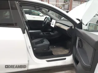 2022 Tesla Model Y Long Range z VIN 7SAYGDEE3NF358487, wystawiony jako IAAI lot #42036969 z przebiegiem 52 723 mil mil oraz . Historia ofert i sprzedaży dostępna na DreamBid. Obrazek 5.
