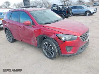 2016 Mazda CX-5 Grand Touring with VIN JM3KE4DY8G0729446, listed as a IAAI auction lot 41871207 with 89,258 mi miles. Bid and sale history available at carsss.com. Image 1.