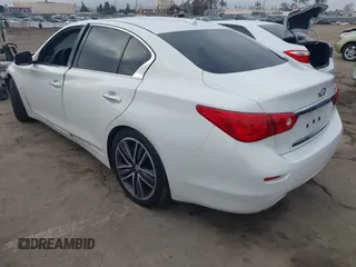2014 Infiniti Q50 Premium with VIN JN1BV7AP0EM688888, listed as a IAAI auction lot 41537933 with 114,260 mi miles and . Bid and sale history available at carsss.com. Image 3.
