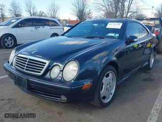 2002 Mercedes-Benz CLK-Class AMG with VIN WDBLJ74GX2T106286, listed as a IAAI auction lot 41737170 with 136,170 mi miles. Bid and sale history available at carsss.com. Image 17.