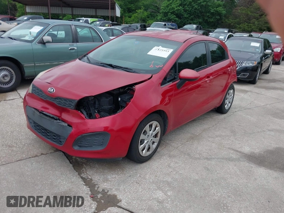 2015 Kia Rio LX with VIN KNADM5A34F6517123, listed as a IAAI auction lot 42125593 with 138,214 mi miles. Bid and sale history available at carsss.com. Image 2.