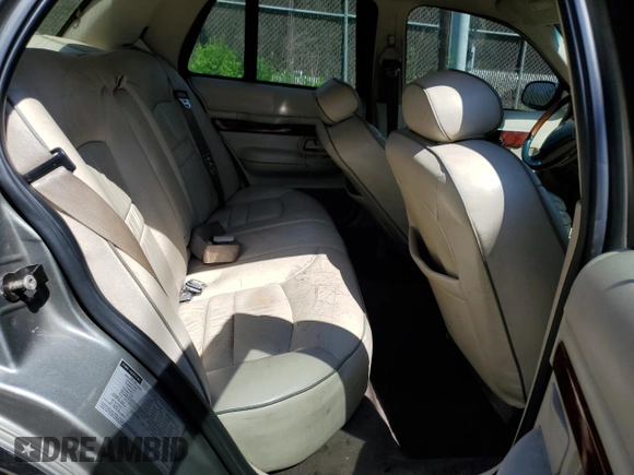 2000 Mercury Grand Marquis LS z VIN 2MEFM75W7YX694301, wystawiony jako Copart lot #57225295 z przebiegiem 141 420 mil mil oraz Szkoda całkowita • Salvage title. Historia ofert i sprzedaży dostępna na DreamBid. Obrazek 10.