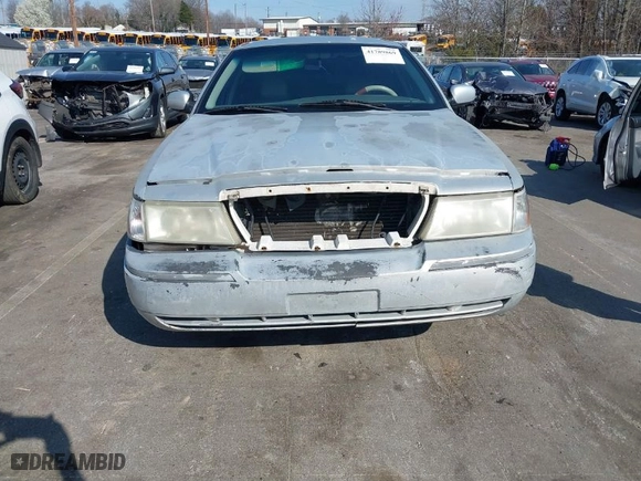 2003 Mercury Grand Marquis LS Premium with VIN 2MEFM75WX3X635171, listed as a IAAI auction lot 41789869 with 252,679 mi miles. Bid and sale history available at carsss.com. Image 13.