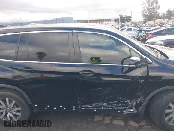 2019 Honda Pilot EX-L with VIN 5FNYF5H51KB013763, listed as a IAAI auction lot 41711089 with 79,651 mi miles and . Bid and sale history available at DreamBid. Image 13.