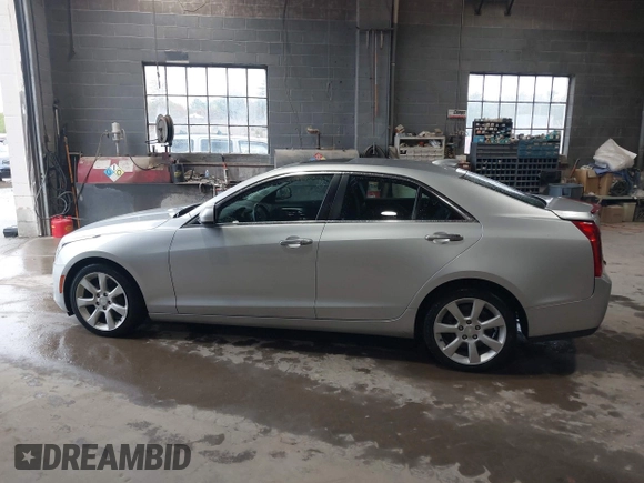 2016 Cadillac ATS Standard AWD z VIN 1G6AG5RX6G0149829, wystawiony jako IAAI lot #42165534 z przebiegiem 40 996 mil mil oraz . Historia ofert i sprzedaży dostępna na DreamBid. Obrazek 14.