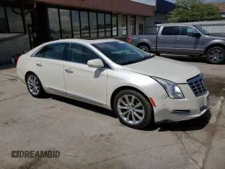 2014 Cadillac XTS Luxury z VIN 2G61M5S33E9193905, wystawiony jako Copart lot #55479605 z przebiegiem 143 006 mil mil oraz Szkoda całkowita • Salvage title. Historia ofert i sprzedaży dostępna na DreamBid. Obrazek 4.