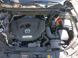 2024 Mazda CX-5 Carbon Edition with VIN JM3KFBAYXR0371954, listed as a IAAI auction lot 41688598 with 13,230 mi miles and . Bid and sale history available at DreamBid. Image 10.