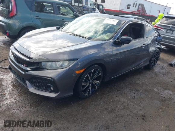 2017 Honda Civic Si with VIN 2HGFC3A56HH754672, listed as a IAAI auction lot 41967990 with 115,091 mi miles and . Bid and sale history available at DreamBid. Image 17.