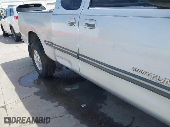 2000 Toyota Tundra SR5 with VIN 5TBRT3411YS070241, listed as a IAAI auction lot 41785990 with 204,276 mi miles and . Bid and sale history available at DreamBid. Image 17.