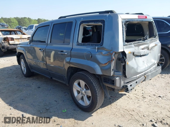 2014 Jeep Patriot Latitude with VIN 1C4NJPFA4ED535148, listed as a IAAI auction lot 42037942 with 192,493 mi miles and . Bid and sale history available at carsss.com. Image 3.