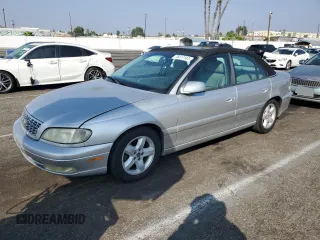 2000 Cadillac Catera z VIN W06VR54R1YR003905, wystawiony jako Copart lot #76417144 z przebiegiem 80 894 mil mil oraz Tytuł czysty. Historia ofert i sprzedaży dostępna na DreamBid. Obrazek 1.