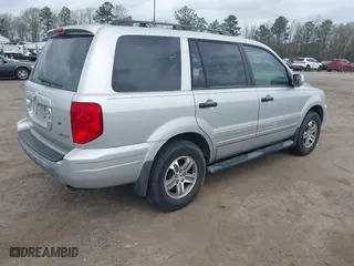 2005 Honda Pilot EX-L with RES with VIN 5FNYF18695B018134, listed as a IAAI auction lot 41962595 with 264,599 mi miles. Bid and sale history available at carsss.com. Image 4.