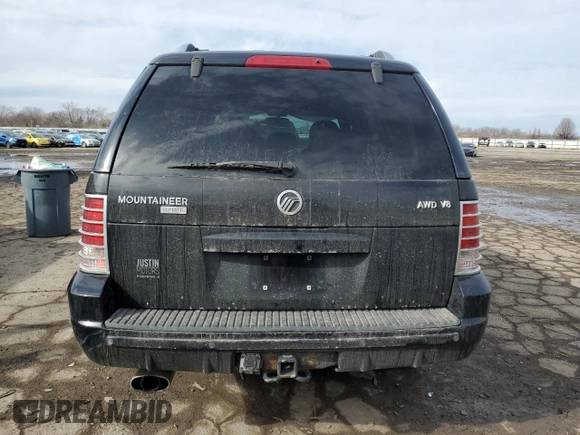 2004 Mercury Mountaineer Convenience z VIN 4M2DU86W94ZJ38048, wystawiony jako Copart lot #46591565 z przebiegiem 130 490 mil mil oraz Tytuł czysty. Historia ofert i sprzedaży dostępna na DreamBid. Obrazek 6.