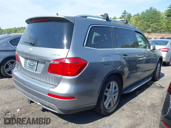2014 Mercedes-Benz GL 450 with VIN 4JGDF7CE0EA290673, listed as a IAAI auction lot 42207889 with 132,251 mi miles and . Bid and sale history available at DreamBid. Image 4.