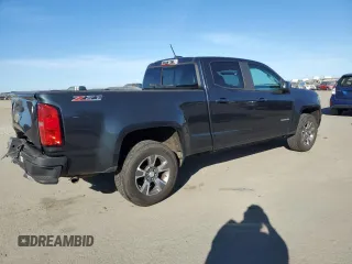 2018 Chevrolet Colorado 4WD Z71 z VIN 1GCGTDEN9J1184710, wystawiony jako Copart lot #47131135 z przebiegiem 108 478 mil mil oraz Szkoda całkowita • Salvage title. Historia ofert i sprzedaży dostępna na DreamBid. Obrazek 3.