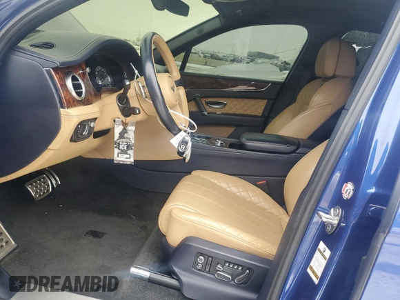 2017 Bentley Bentayga W12 z VIN SJAAC2ZV2HC014080, wystawiony jako Copart lot #44806115 z przebiegiem 63 077 mil mil oraz Szkody całkowita. Historia ofert i sprzedaży dostępna na DreamBid. Obrazek 7.