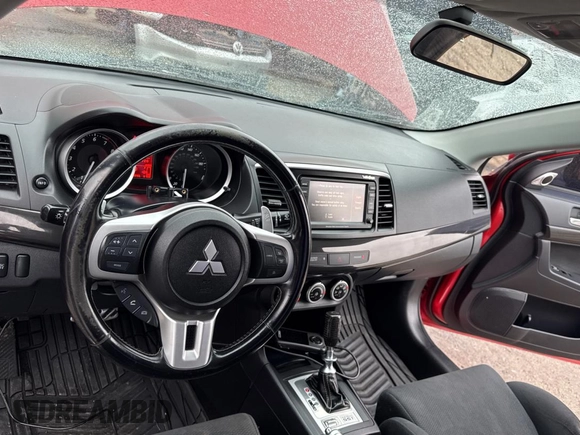2008 Mitsubishi Lancer Evolution MR z VIN JA3AW56V78U051033, wystawiony jako Copart lot #82855894 z przebiegiem 92 726 mil mil oraz Szkoda całkowita • Salvage title. Historia ofert i sprzedaży dostępna na DreamBid. Obrazek 9.