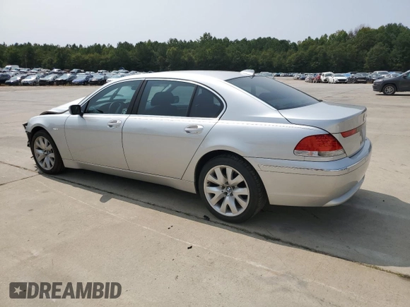 2004 BMW 7 Series 745Li with VIN WBAGN63444DS47664, listed as a Copart auction lot 71046044 with 144,598 mi miles and Salvage title. Bid and sale history available at DreamBid. Image 2.