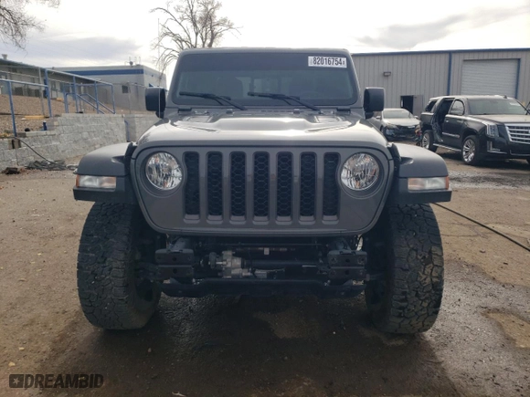 2023 Jeep Gladiator Rubicon with VIN 1C6JJTBG4PL527598, listed as a Copart auction lot 82016754 with 16,325 mi miles and Salvage Title. Bid and sale history available at carsss.com. Image 5.