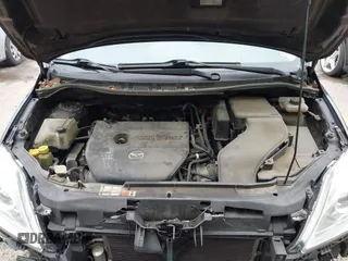 2010 Mazda 5 Sport with VIN JM1CR2W33A0360848, listed as a IAAI auction lot 42104824 with 151,084 mi miles and . Bid and sale history available at DreamBid. Image 10.