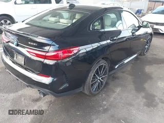 2022 BMW 2 Series 228i xDrive with VIN WBA73AK0XN7K87285, listed as a IAAI auction lot 41194510 with 23,099 mi miles. Bid and sale history available at carsss.com. Image 4.