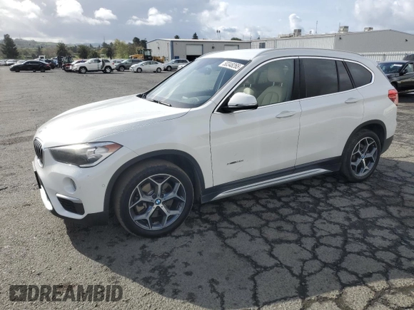 2017 BMW X1 sDrive28i with VIN WBXHU7C33H5H32827, listed as a Copart auction lot 50348265 with 117,412 mi miles and Salvage Title. Bid and sale history available at carsss.com. Image 1.