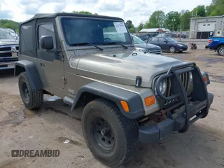 2003 Jeep Wrangler SE with VIN 1J4FA29193P302424, listed as a IAAI auction lot 42179494 with 120,712 mi miles and . Bid and sale history available at DreamBid. Image 1.