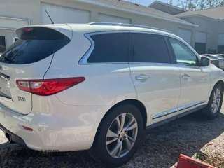 2013 Infiniti JX35 with VIN 5N1AL0MN7DC301687, listed as a Copart auction lot 79215504 with 170,164 mi miles and Clean Title. Bid and sale history available at carsss.com. Image 4.