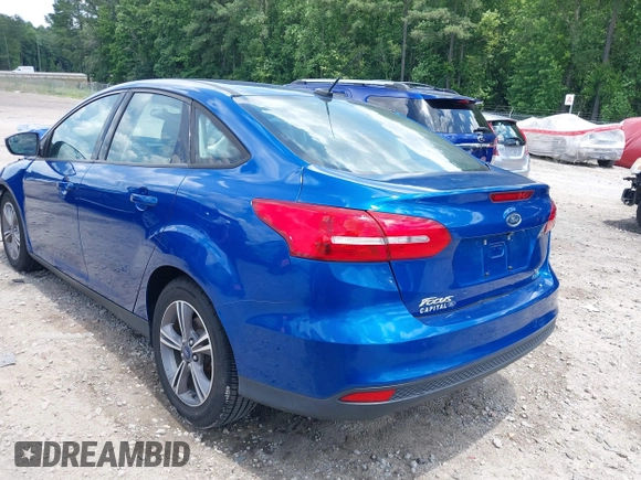 2018 Ford Focus SE with VIN 1FADP3FE8JL238024, listed as a IAAI auction lot 42463643 with Not provided miles and . Bid and sale history available at DreamBid. Image 3.