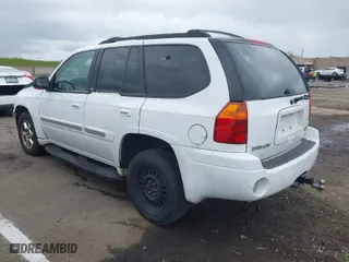 2003 GMC Envoy SLE with VIN 1GKDS13S732101189, listed as a IAAI auction lot 41913632 with 245,889 mi miles. Bid and sale history available at carsss.com. Image 3.