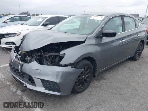 2018 Nissan Sentra S with VIN 3N1AB7AP0JY344974, listed as a IAAI auction lot 42195130 with 31,572 mi miles and . Bid and sale history available at DreamBid. Image 2.