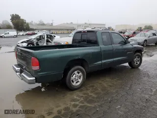 2002 Dodge Dakota SLT with VIN 1B7GL42X52S528521, listed as a Copart auction lot 85598784 with 168,740 mi miles and Salvage Title. Bid and sale history available at carsss.com. Image 3.