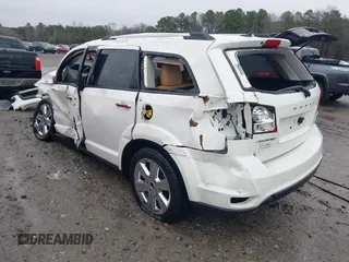 2012 Dodge Journey Crew with VIN 3C4PDCDG7CT165224, listed as a IAAI auction lot 41568580 with 140,211 mi miles and . Bid and sale history available at DreamBid. Image 3.