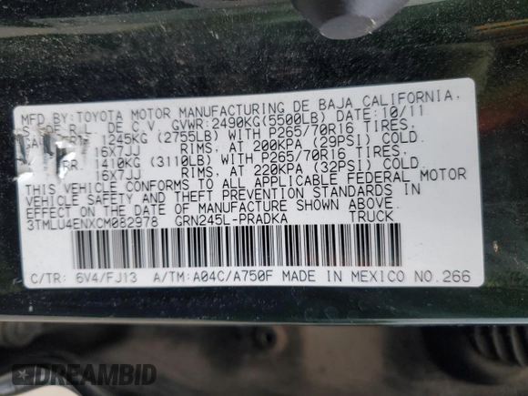 2012 Toyota Tacoma z VIN 3TMLU4ENXCM082978, wystawiony jako Copart lot #60069475 z przebiegiem 169 533 mil mil oraz Szkoda całkowita • Salvage title. Historia ofert i sprzedaży dostępna na DreamBid. Obrazek 13.